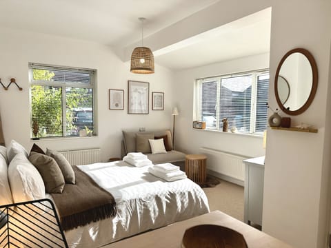 Sumptuous guest suite with fur rugs and beautiful styling