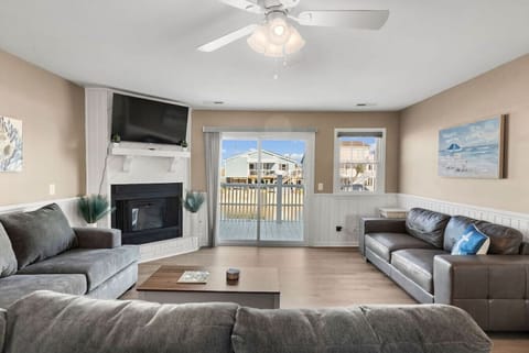 Welcome to our spacious living room with views of the water