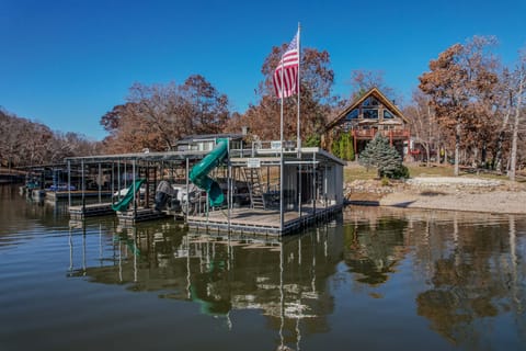 Dock, upper swim deck, 2 slides and 2 swings.