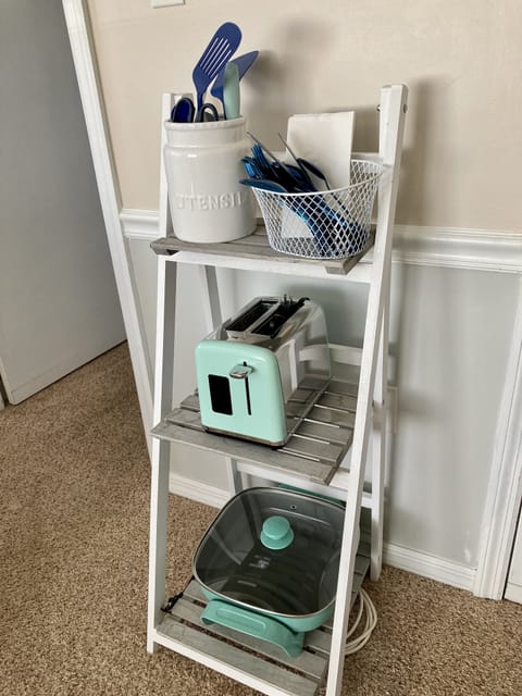 Toaster, elec frying  pan, serving utensils, knives, forks, spoons for 6 people.