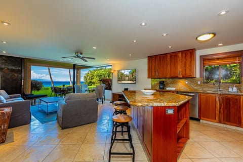 Seating for three at the island in the kitchen