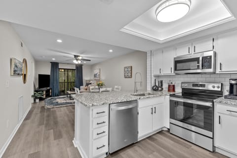Fully equipped kitchen with stainless steel appliances 