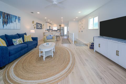 Spacious living, dining and kitchen areas.