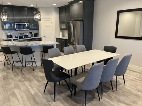 Enjoy dinner with family and friends, dining table seats 8, island seats 4