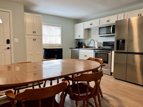 6 person farm table in kitchen area