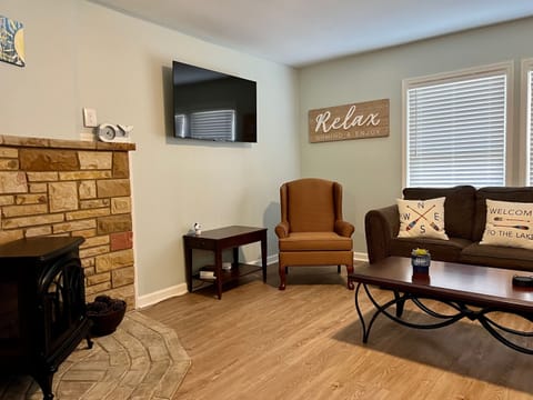 Smart TV and electric fireplace in living area