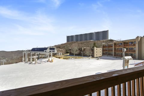 Watch skiers right off your balcony