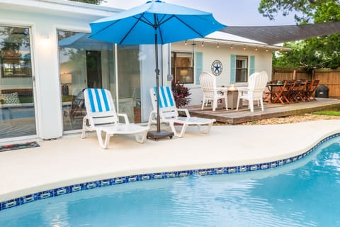 Private pool, fire pit deck and charcoal grill in a fenced backyard !
