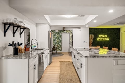 Features ample cabinetry, high-end appliances, and plenty of room to cook, dine, and entertain.