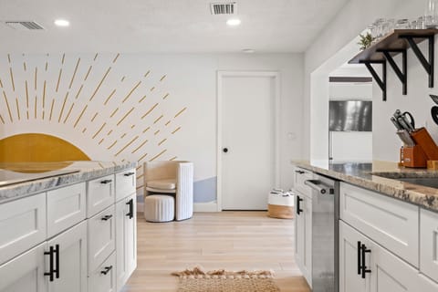 Features ample cabinetry, high-end appliances, and plenty of room to cook, dine, and entertain.