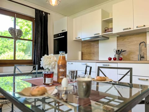 Furniture, Interior Design, Kitchen, Countertop, Kitchen Appliance, Flooring, Wood, Cabinetry, Ceiling, Chair