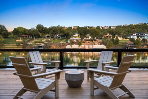 Our top deck where four seats meet stunning views of Lake Austin.