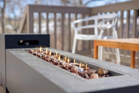 Turn on the gas firepit and enjoy time around the fire.
