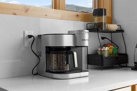 There is a keurig duo so you can make one cup or a whole pot! Always stocked with cream and sugar!