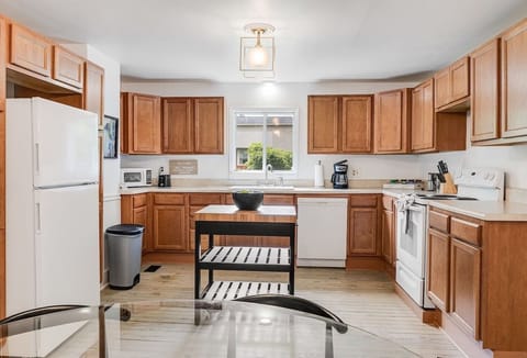 Wide view of the kitchen from the dining table