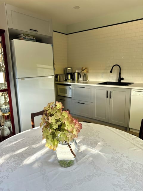 A bright and fully equipped kitchen makes cooking and dining in an easy option.