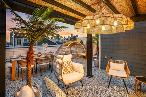 Our Luxxe Cabana Rooftop is unlike any other! Featuring a 12 person dining table, 2 large cabanas, and a Mykonos inspired lounge area with seating for 16!