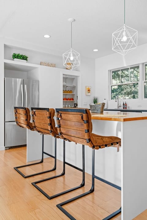 Your modern kitchen features stylish bar seating and everything you need to cook at home.