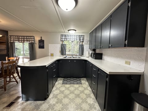 Kitchen: Fully stocked with utensils, cookware, plates, etc.
