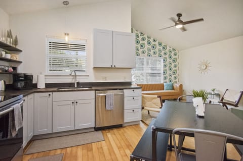 Fully stocked  kitchen + dining area 