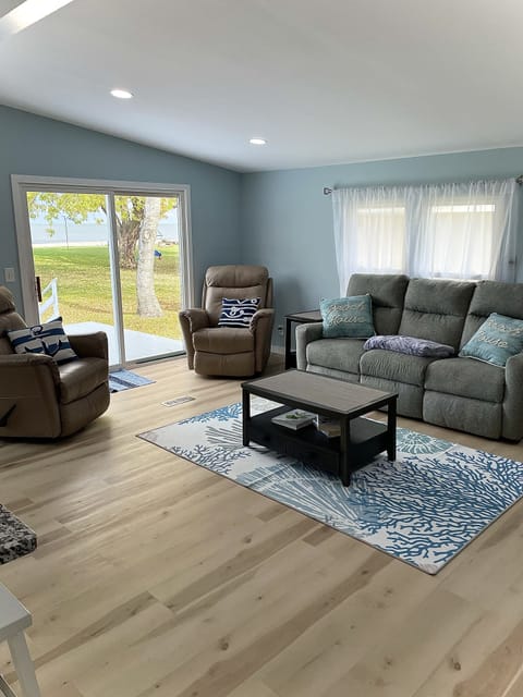 Living room area with stunning views of Saginaw Bay