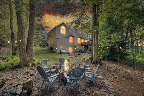 Pull a chair up to the fire pit as the sky fades behind the trees — s'mores in hand, this is where the whole trip finally slows down.
