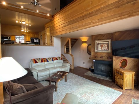 Spacious living room has three recliners and plenty of seating