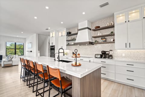 Kitchen island with breakfast bar.