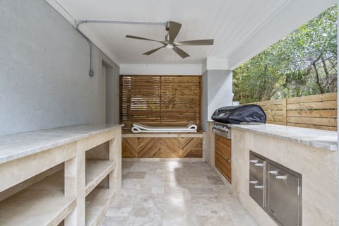 Private outdoor oasis complete with outdoor kitchen