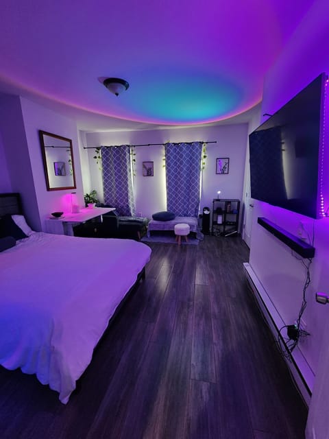 Ambient lights, Queen Bed, Smart TV, lounge chair, Adjustable table 