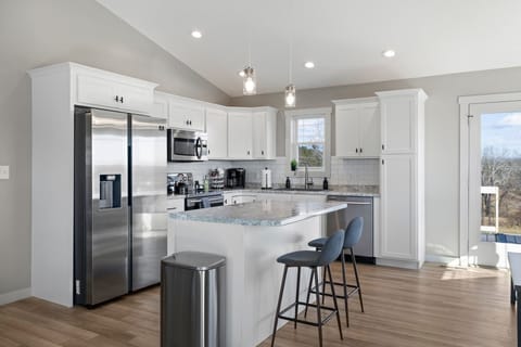 The kitchen has everything you could need to whip up a meal! Pots, pans, cutting boards, blender, cooking utensils, crockpot as well as salt, pepper and cooking oil!