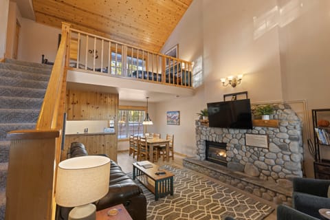 The loft sleeping area is open to the living space. 