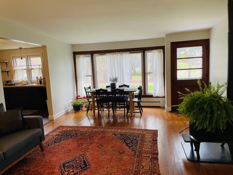 The open dining and living room area has plenty of comfortable seating.