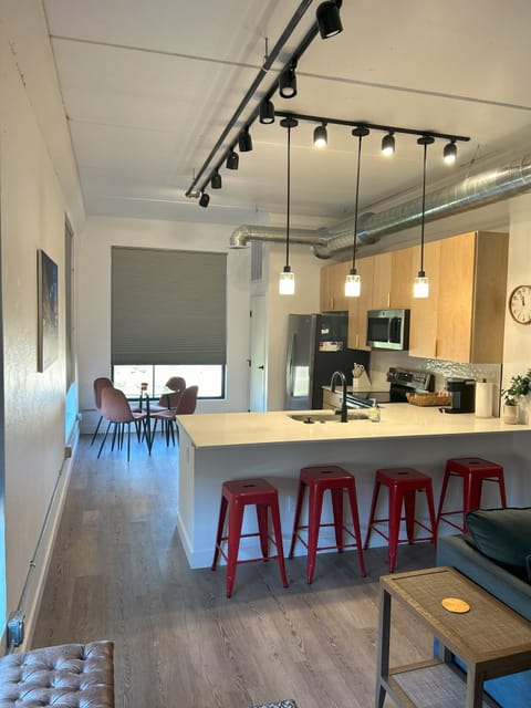 Spacious kitchen with plenty of seating options.