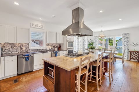 Spacious kitchen with seating for four at the island