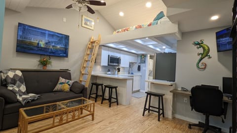 couch, coffe table and dining area