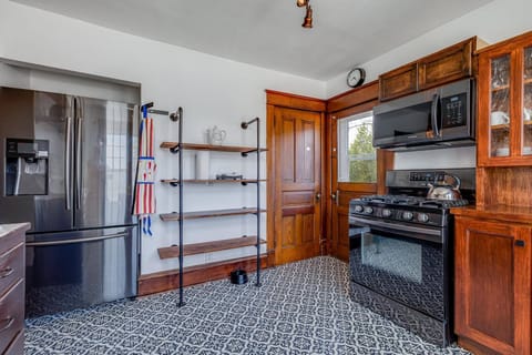 Updated refrigerator, stove and microwave.