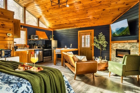 My family poured our hearts into building and designing this cabin. It kept its rustic charm yet modern interior design. It also features a high ceiling that allows ample light during the day,