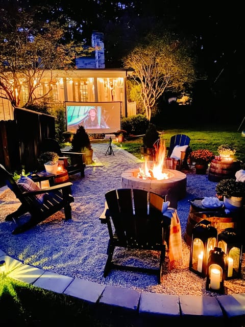 Outdoor movie set up in front of the fire pit (additional add on fee)

