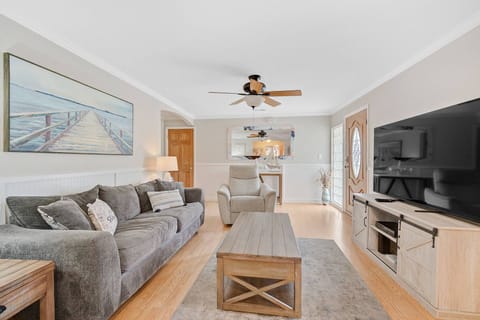 Enjoy a movie on the large screen TV or a book on the comfortable couch