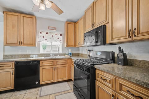Spacious Kitchen fully stocked for making meals at home