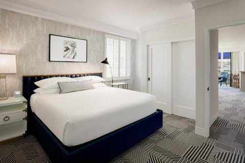 Sink into a cloud-soft bed beneath calming, natural light.