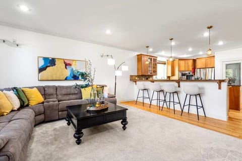 The kitchen is right next to the living room