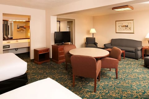 Gather for snacks and conversation in this roomy sitting area.