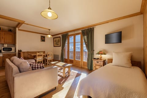 Val d'Arve 5 living area with with extra bed