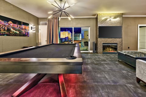 Black stainless steel regulation size pool table. 