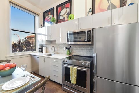 Newly upgraded kitchen in 2023, includes fridge, stove, microwave & dishwasher!