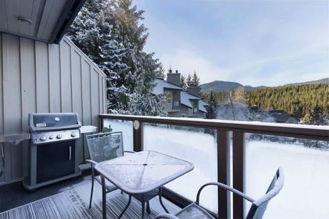 - Enjoy serene mountain mornings on your private balcony with scenic forest views  
- Fire up the outdoor BBQ grill for cozy après-ski dinners in the crisp alpine air  
- Breathe in the winter charm of Whistler from your snow-dusted patio retreat  