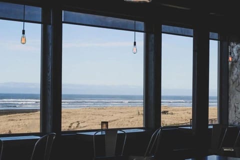 Watch waves roll in from a warm, window-lined seat.