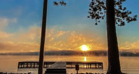 Enjoy stunning sunrises and lake adventure just steps from the back porch!